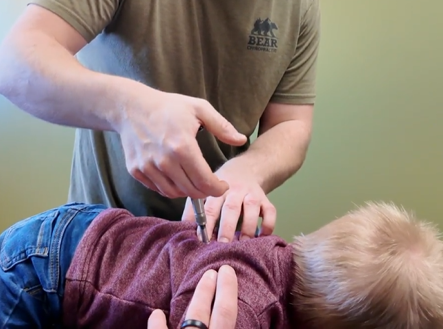 Activator Method on kids back pain