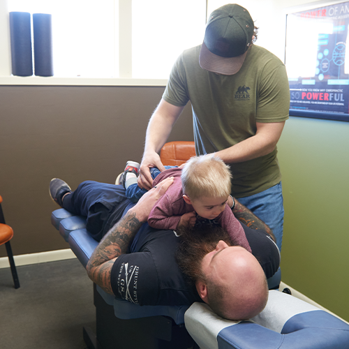 Dr. Aaron Zimmerman doing pediatric care