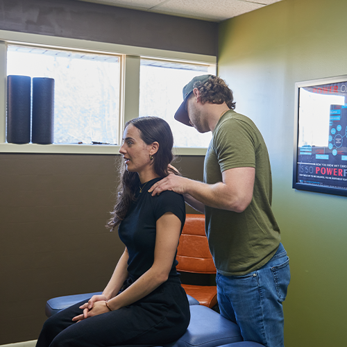 Dr. Aaron Zimmerman treating patients work injury pain