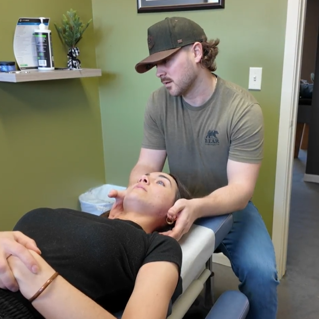 Dr. Aaron Zimmerman treating patients work injury pain